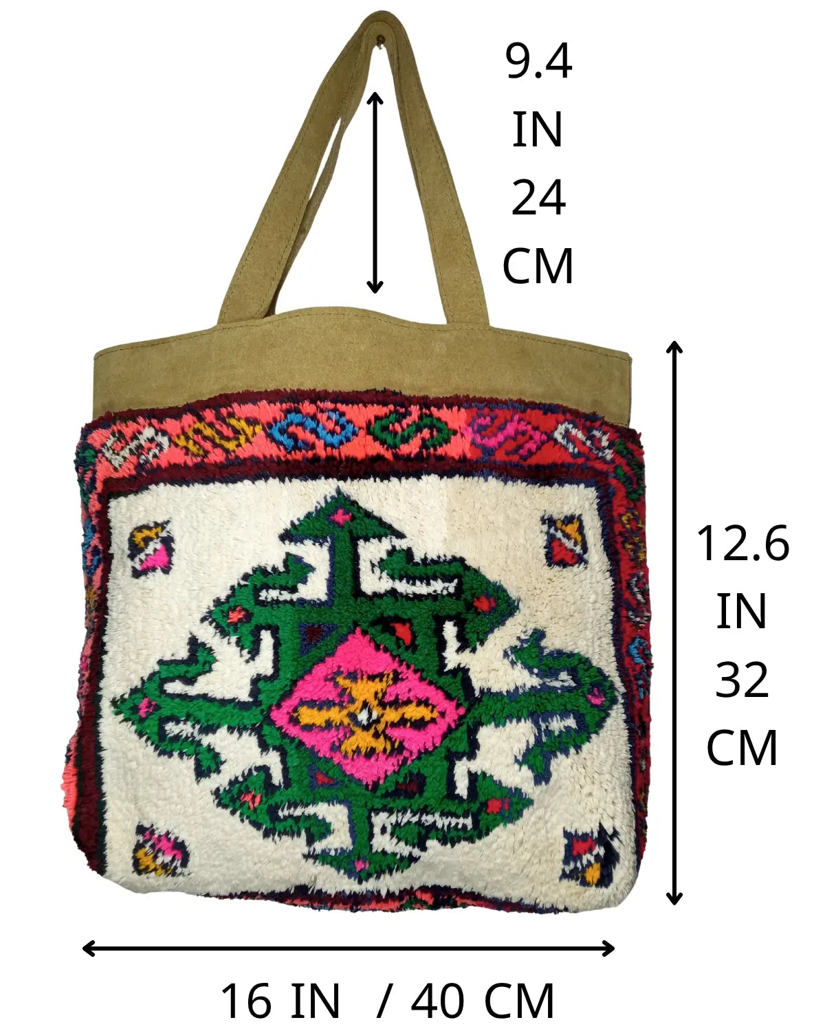 Detailed view of the tan suede shoulder straps and top panel of a handmade boho tote bag, showing the texture and stitching.