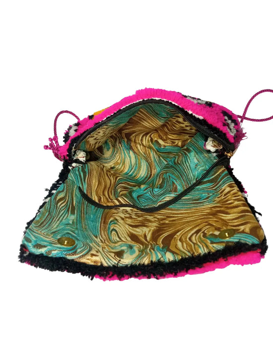 Drawstring bag with marbled pattern and pink edges on a white background