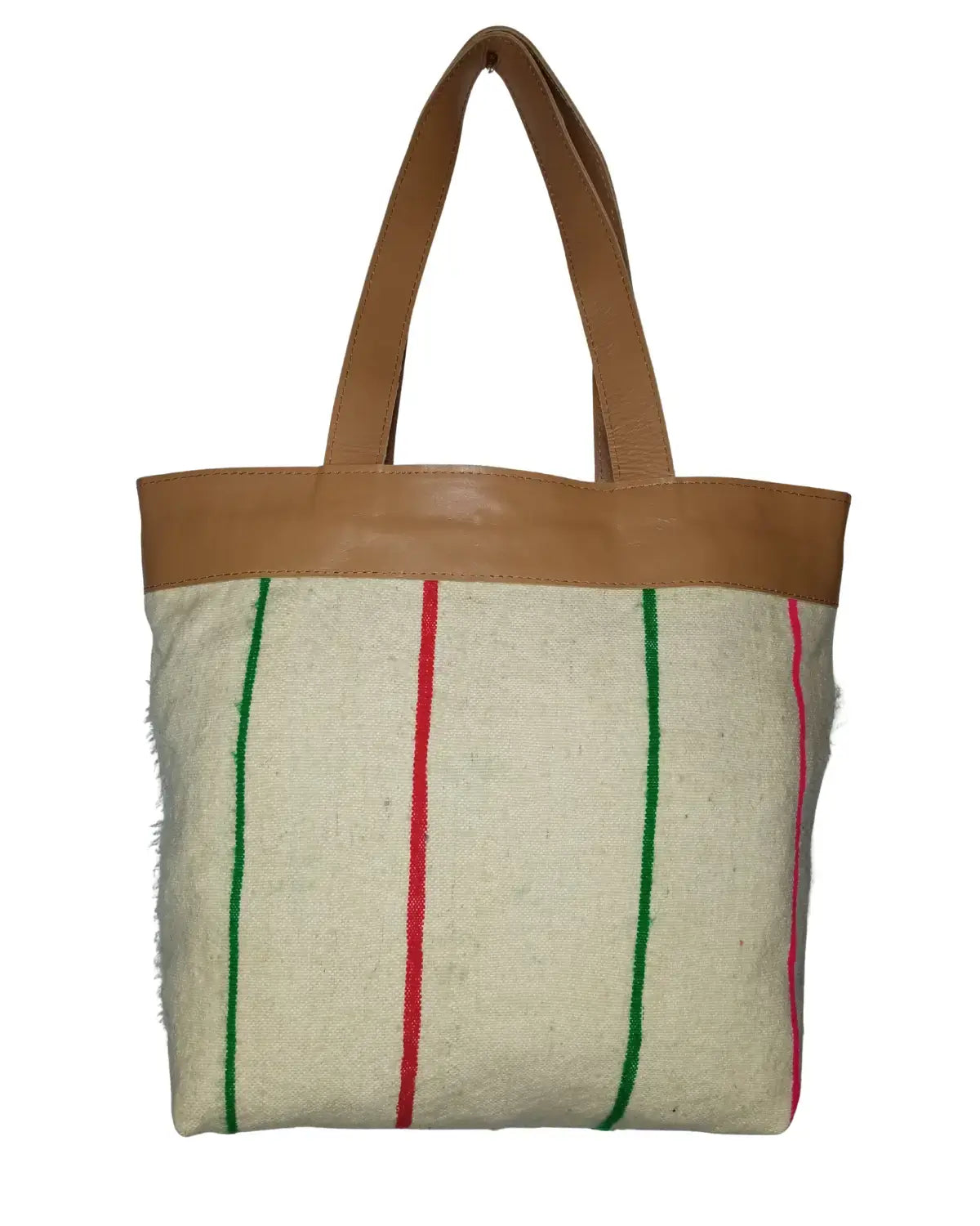 The reverse side of the tote bag, showing a cream woven fabric with vertical red and green stripes and tan leather handles